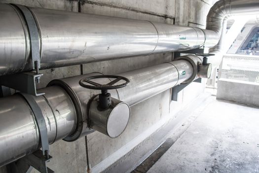 cables and piping as found inside of a thermal power
