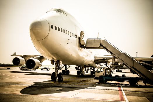 Airplane near the terminal in an airport cockpit