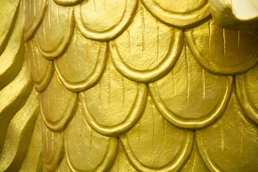 Gold carp scales statue
