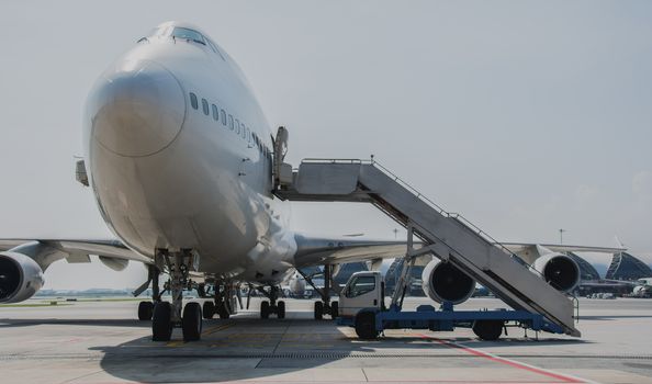 Airplane near the terminal in an airport cockpit