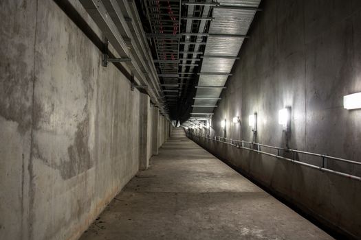 Empty industrial garage room interior with concrete floor and wall background