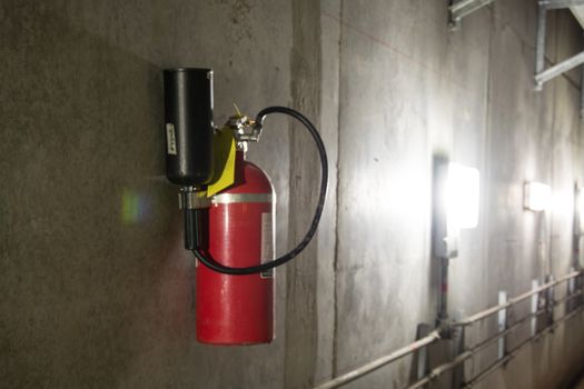 Fire extinguisher in dimly lit corridor Fire safety underground