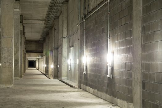 Empty industrial garage room interior with concrete floor and wall background