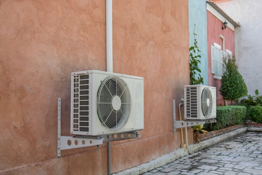 air compressor on the vintage brick wall