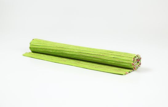 Rolled ribbed green place mat
