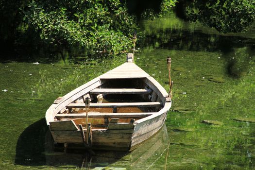 small fishing boat in lake