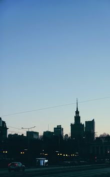 Cityscape silhouette of a European city as background, evening view of Warsaw, Poland