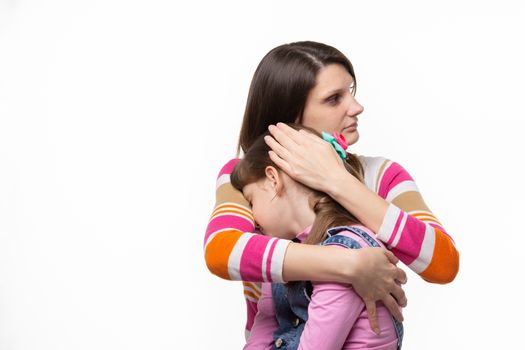 mom calms upset daughter isolated on white background