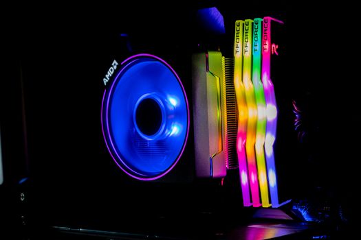 Chonburi, Thailand - MAY 16, 2020: The colorful of AMD Wraith Prism Cooler for CPU Ryzen9 3900X with four T-Force DELTA RGB DDR4 DIMMs in the computer case.