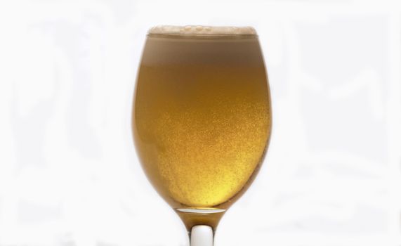 Close up of beer into transparent glass, side view, white background. Bubbles rising to the surface, froth