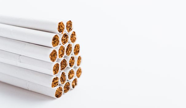 31 May of World No Tobacco Day, Close up front stack pile cigarette or tobacco on white background with copy space, Warning lung health concept