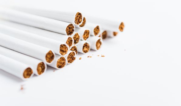 31 May of World No Tobacco Day, Close up front stack pile cigarette or tobacco on white background with copy space, Warning lung health concept