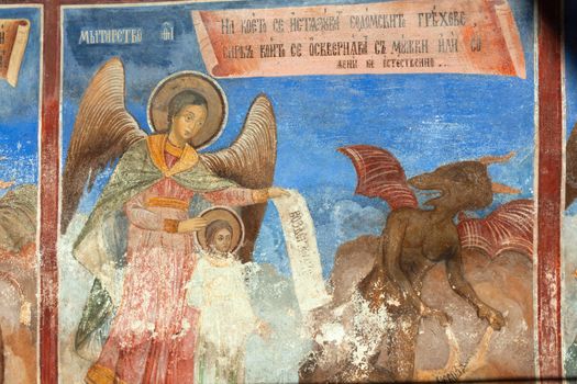 Rila Mountains, Bulgaria - 8 October 2017: Fresco showing sodomy sin