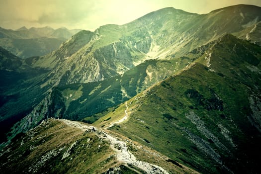 Fog in mountains. Fantasy and colorfull nature landscape. Nature conceptual image.