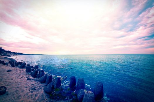 Ocean landscape with bright sky, beach and blue water. Instagram vintage picture.