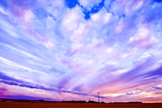 Beautiful colorful sky landscape with after storm clouds. Nature conceptual image.