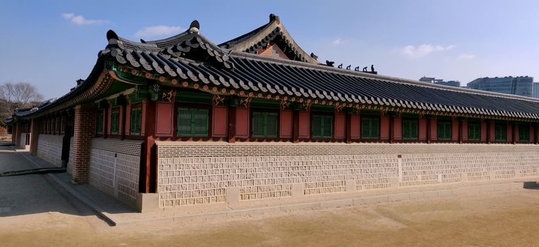 An old structure Inside the ancient Gyeongbokgung Palace, Seoul, Korea during day with bright sky