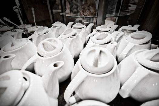 A lot of tea pots in the cafeteria. Food and drinks conceptual image.