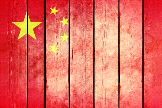 China wooden grunge flag. China flag painted on the old wooden planks. Vintage retro picture from my collection of flags.