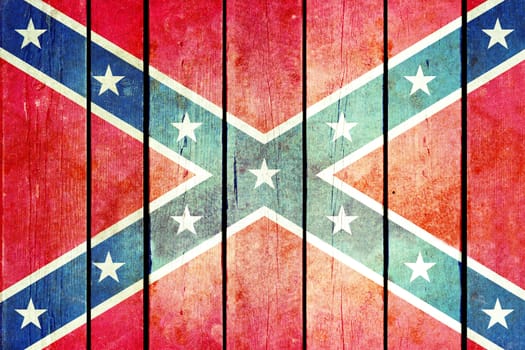 Confederate wooden grunge flag. Flag of the confederacy painted on the old wooden planks. Vintage retro picture from my collection of flags.