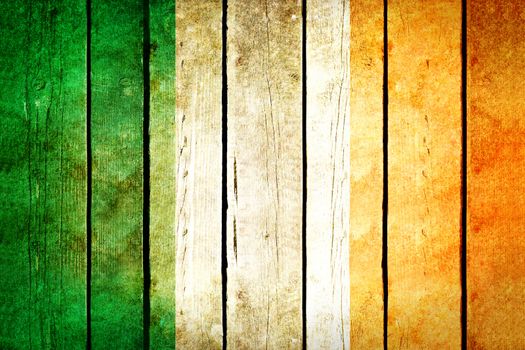 Ireland wooden grunge flag. Ireland flag painted on the old wooden planks. Vintage retro picture from my collection of flags.