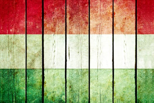 Hungary wooden grunge flag. Hungary flag painted on the old wooden planks. Vintage retro picture from my collection of flags.