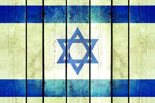 Israel wooden grunge flag. Israel flag painted on the old wooden planks. Vintage retro picture from my collection of flags.