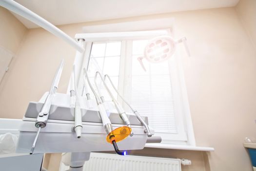 Professional Dentist tools in the dental office. Dental Hygiene and Health conceptual image.