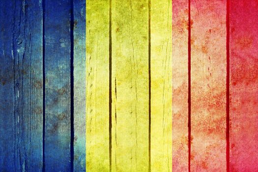 Romania wooden grunge flag. Romania flag painted on the old wooden planks. Vintage retro picture from my collection of flags.