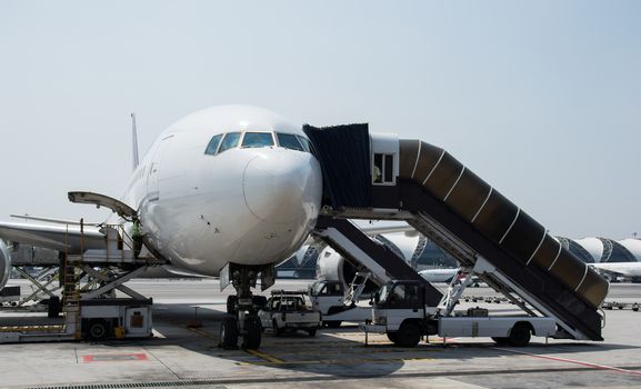 Airplane near the terminal in an airport cockpit