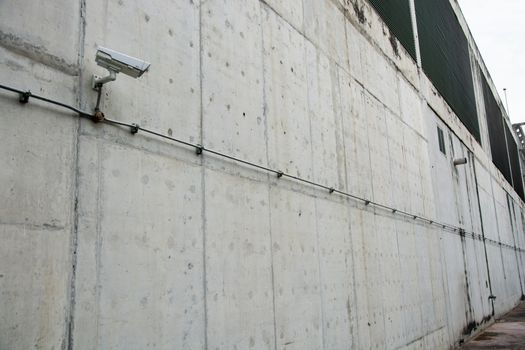 CCTV camera or surveillance operating with electric door in back