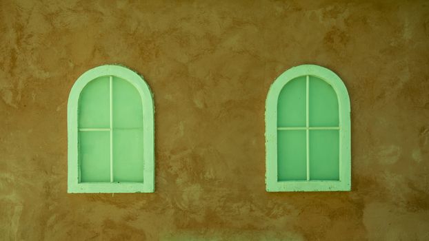 Vintage window on nice color cement wall can be used for background