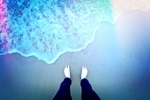 Bare feet on the beach. Instagram retro  vintage picture.