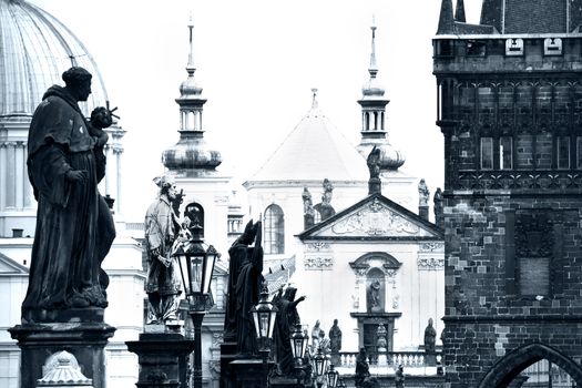 Charles Bridge in Prague. Statues on the bridge. Black&white picture.