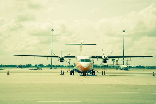 Commercial airplane  on taxi way, vintage color style