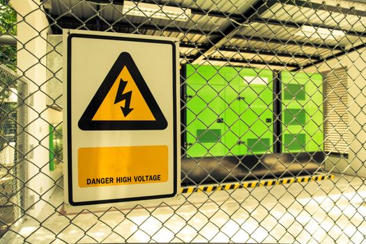 Electric power station in metal fence