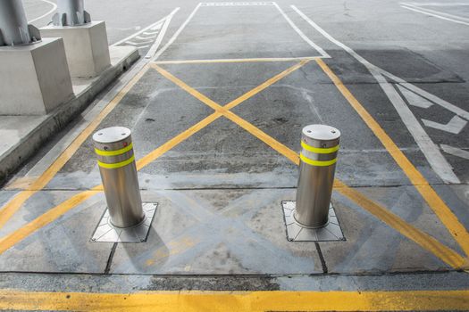bollards with Security at the gate