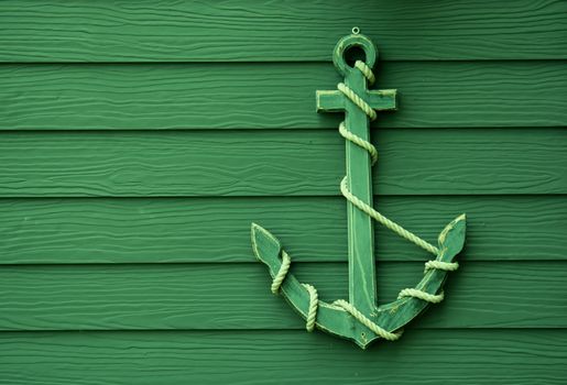 wooden anchor on wall vintage background