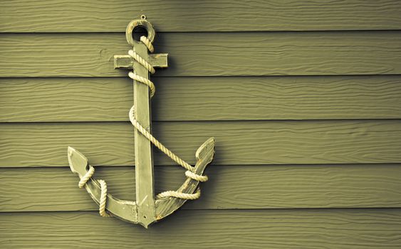 wooden anchor on wall vintage background