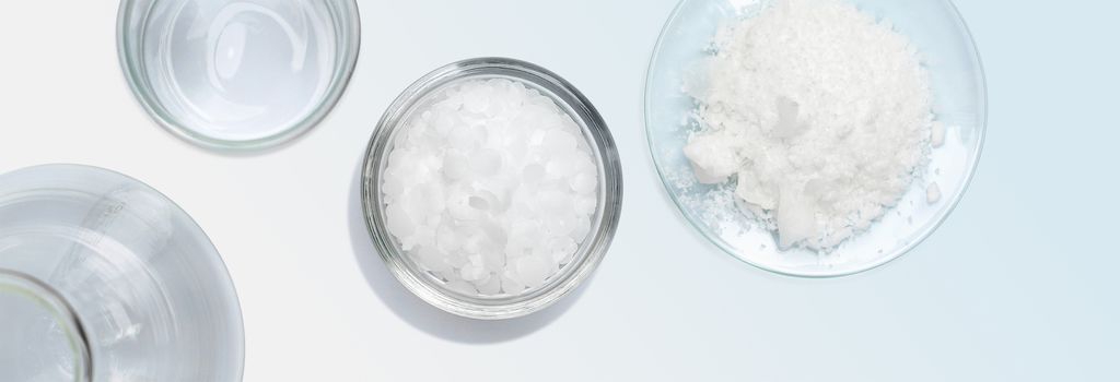 Cosmetic chemicals ingredient on table. Emulsifier, Ethanolamine, Acid, Cetyl Alcohol