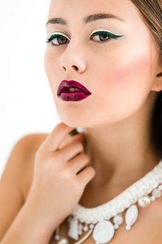 girl in a white blouse and black skirt on a white background