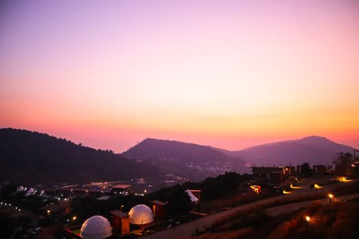 The sunset in a thai village near mountains in Chiang Mai, Thailand. The mountain scenery view