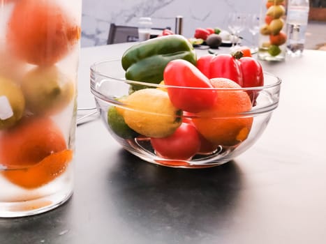 A bowl of fruit on a table. High quality photo