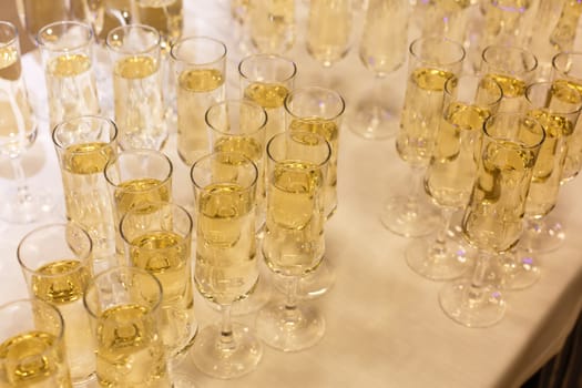 A table filled with wine glasses. High quality photo