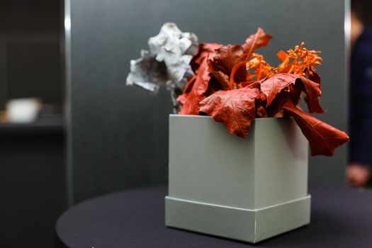 A vase of flowers on a table. High quality photo