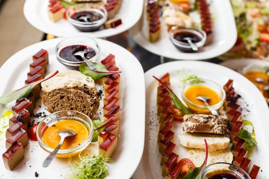 A table topped with plates of food on a plate. High quality photo