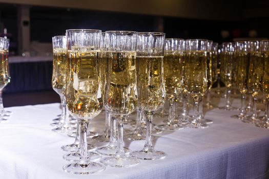 A glass filled with wine glasses. High quality photo