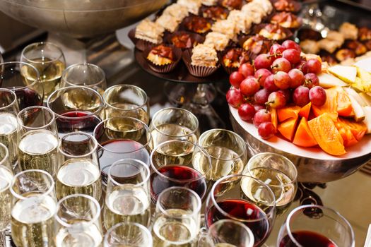 A dining table filled with wine glasses. High quality photo