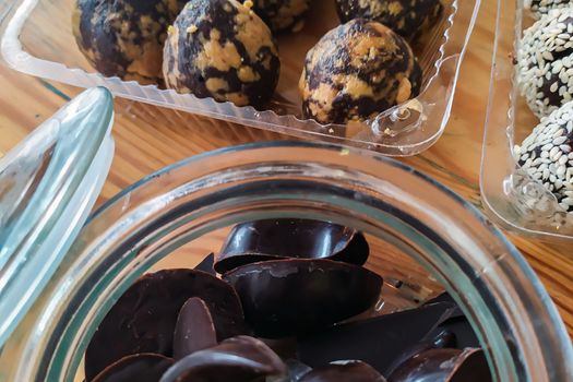 Selection of handmade chocolates. Chocolate is one of the most popular holiday gifts. On Valentine's Day, a box of chocolates is traditional, usually presented with flowers and greeting card.