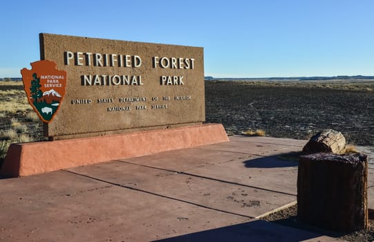 USA, PHENIX, ARIZONA- NOVEMBER 17, 2019: information sign with the name of the park Petrified Forest National Park, Arizona